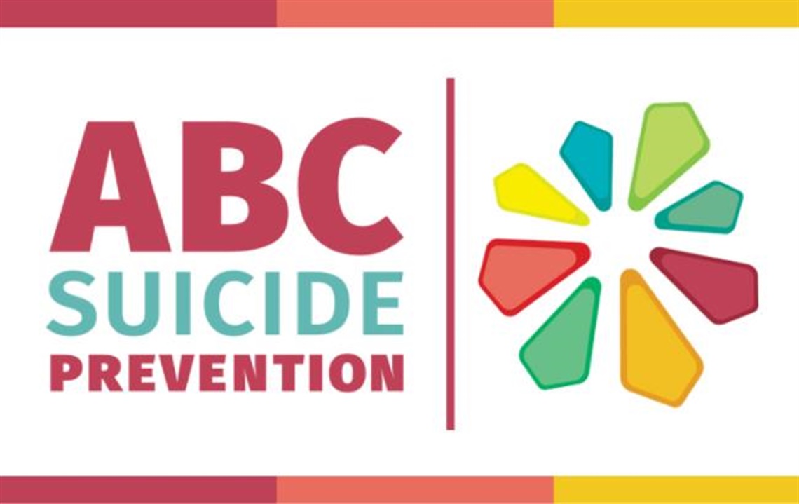 Text reads ABC Suicide Prevention. Image contains a multiple colored flower.